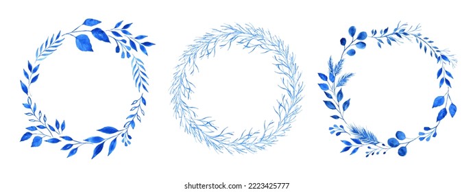 Set of Watercolor wreaths of blue leaves and branches. Hand painted botanical compositions in indigo blue. Isolated on white. Perfect for cards and invitations. Vector.