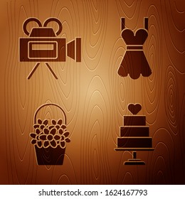 Set Wedding cake with heart, Cinema camera, Flowers in a basket and Woman dress on wooden background. Vector