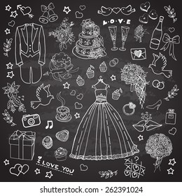 Set of wedding icons on the blackboard. Vector illustration. Hand drawn. Illustration for greeting cards and other printing and web projects.