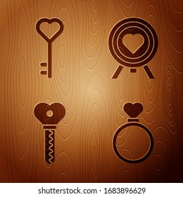 Set Wedding rings, Key in heart shape, Key in heart shape and Heart in the center of darts target aim on wooden background. Vector
