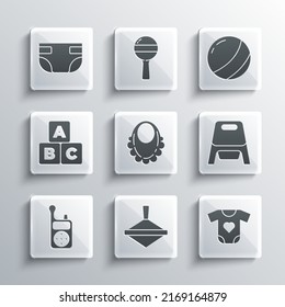Set Whirligig toy, Baby clothes, potty, bib, Monitor Walkie Talkie, ABC blocks, absorbent diaper and Beach ball icon. Vector
