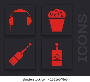 Set Whiskey bottle , Headphones , Popcorn in cardboard box  and Champagne bottle  icon. Vector