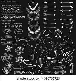 set of white arrows, brushes, banners and elements for design on a dark background