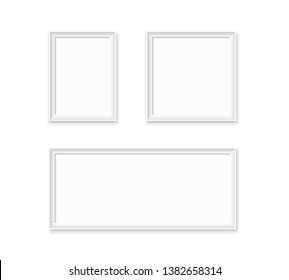 Set of white blank photo frames.