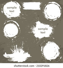 Set of white blots and ink splashes. Abstract elements for design in grunge style. Round frames.