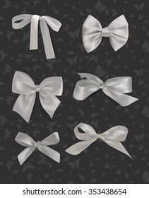 Set of white bows with butterflies on the background