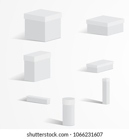 A set of white boxes with lids on a light background