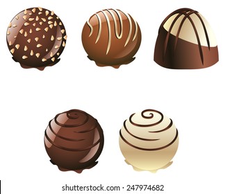 Set of white and brown chocolate candies with decorations.