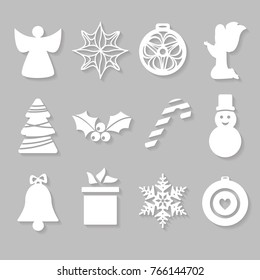 set of white Christmas symbols on the grey background