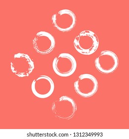 set of white circle brush strokes for frames, icons, design elements on living coral color trend 2019 background