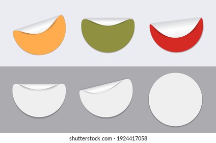 Set of white and colorful round stickers with folded corner on grey background