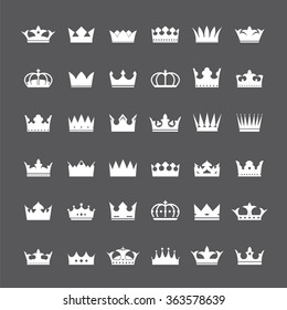 Set of white crowns. Vector Icons