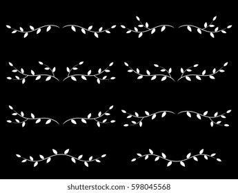set of white decorative tree branches with leaves