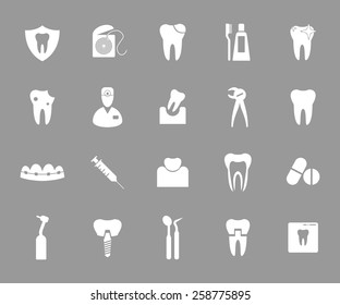 Set of white dental icons on grey background. 