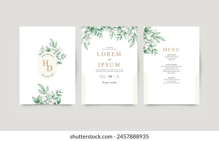 Set of white floral wedding invitations and green leaves