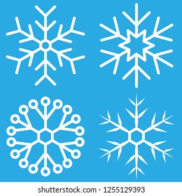 set of white four snowflakes on blue,vector illustration.