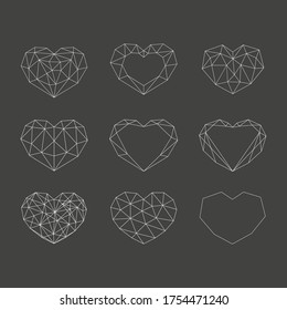 Set of white geometric polygonal hearts. Vector icons isolated on black background