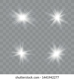Set of white glowing lights effects isolated on transparent background. Sun flash with rays and spotlight. Glow light effect. Star burst.