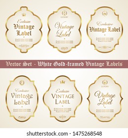 Set of white gold-framed vintage labels