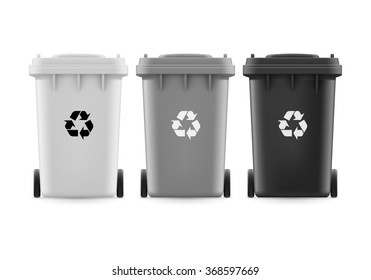 Set of white grat and black buckets for trash with sign arrow