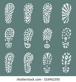 Set of white grunge shoe tracks. Hand drawn doodles Vector illustration. 