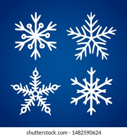 Set of white hand drawn snowflake icons isolated on blue gradient background. New year and winter doodle symbol for print, web, design, decoration, logo or mobile app