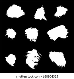set of white ink brush strokes. Collection of grunge hand-drown strokes for your design. Isolated elements. Vector illustration.