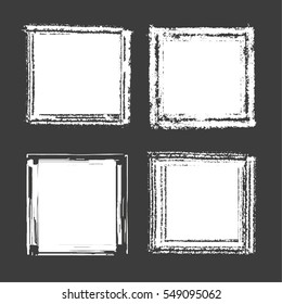 Set of white ink grunge frames on black background vector illustration.