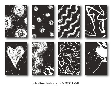 Set of white ink hand drawing on black background. Collection for your design, brush strokes element, vector abstract cards of standard format.