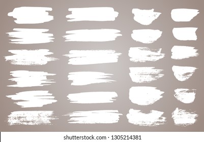 Set of white ink vector stains. Vector black paint, ink brush stroke, brush, line or round texture. Dirty artistic design element, box, frame or background for text.