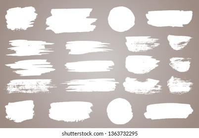 Set of white ink vector stains. Vector black paint, ink brush stroke, brush, line or round texture. Dirty artistic design element, box, frame or background for text.