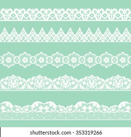 Set of white lace borders on green background