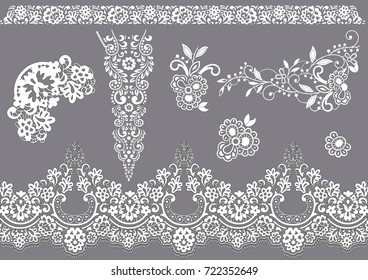 Set of white lace elements on the grey background (all the elements are isolated)