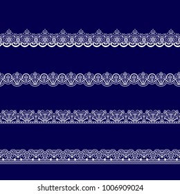 set of white lace ribbons on a blue background