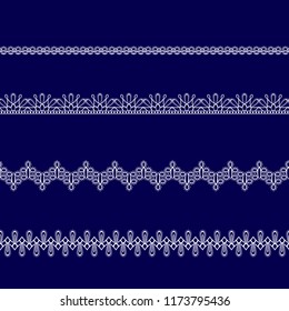 set of white lace ribbons on a blue background