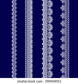 set of white lace ribbons on a blue background