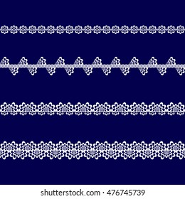 set of white lace ribbons on a blue background
