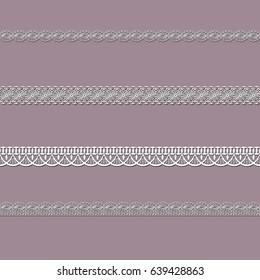 set of white lace ribbons on a pink background