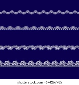set of white lace ribbons on a blue background