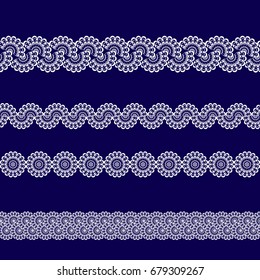 set of white lace ribbons on a blue background