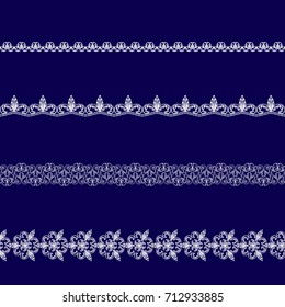 set of white lace ribbons on a blue background