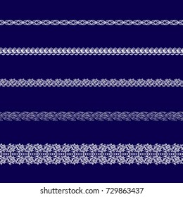 set of white lace ribbons on a blue background