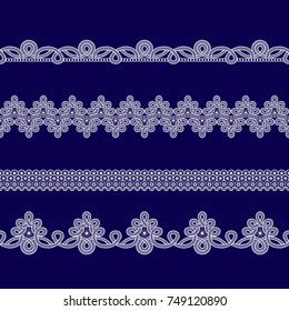 set of white lace ribbons on a blue background