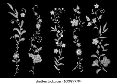 set of white lace. Traditional folk flower fashionable embroidery on the black background. A bouquet of roses and a dog rose, for printing on clothes, vector