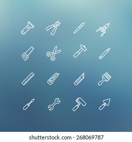 Set of white linear renovation icons on blue blurry background vector