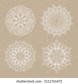 Set of white mandalas isolated on beige, ecru background. Decorative round ornaments. Anti-stress therapy patterns. Henna tattoo design. Yoga logos, backgrounds for meditation poster.