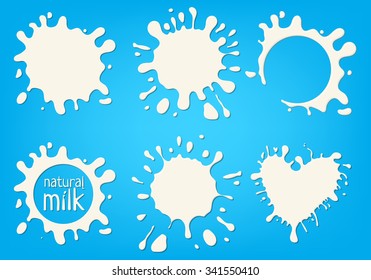 Set White Milk Splash And Blot. Isolated On Blue