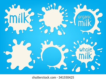 Set White Milk Splash And Blot. Isolated On Blue