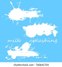 Set of white milk splashes and splatters