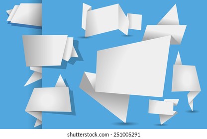 set of white origami tags, banners and labels on a  blue background